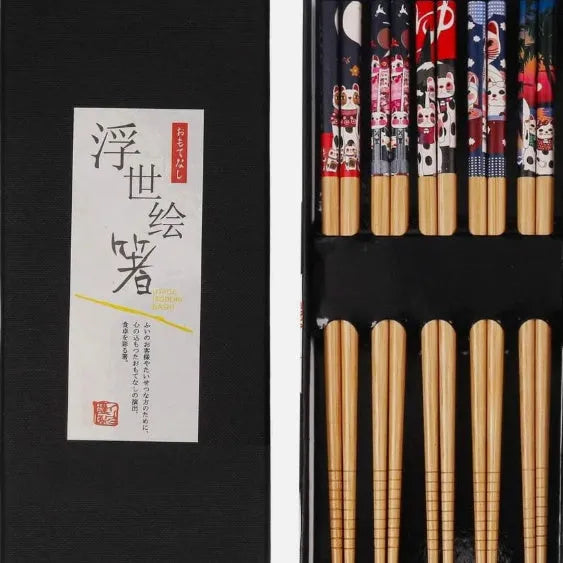 Set of five Japanese-style patterned bamboo chopsticks with lucky cat or elegant blue design.