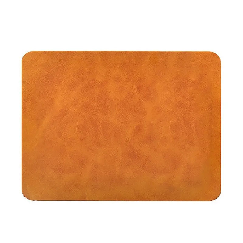 Brown leather wireless charging mouse pad with micro-USB cable for fast Qi charging.