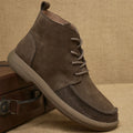 Grey retro Martin boots with genuine leather upper, wedge heel, and front lace-up design.