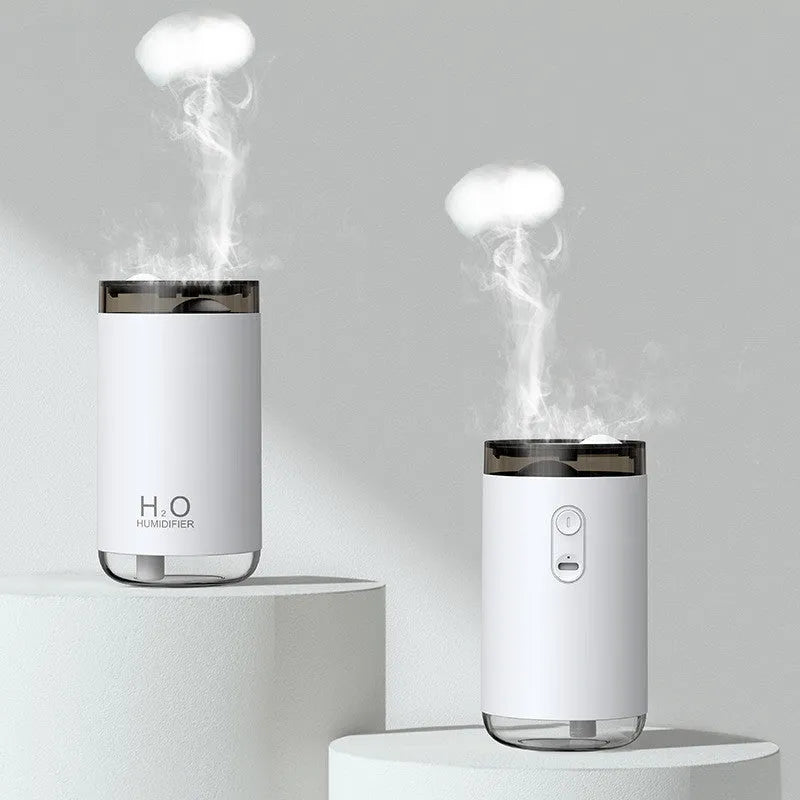 White USB jellyfish humidifier with warm night light on a table