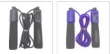 Black and blue skipping rope with sponge handles laid straight to show its 3-metre length.