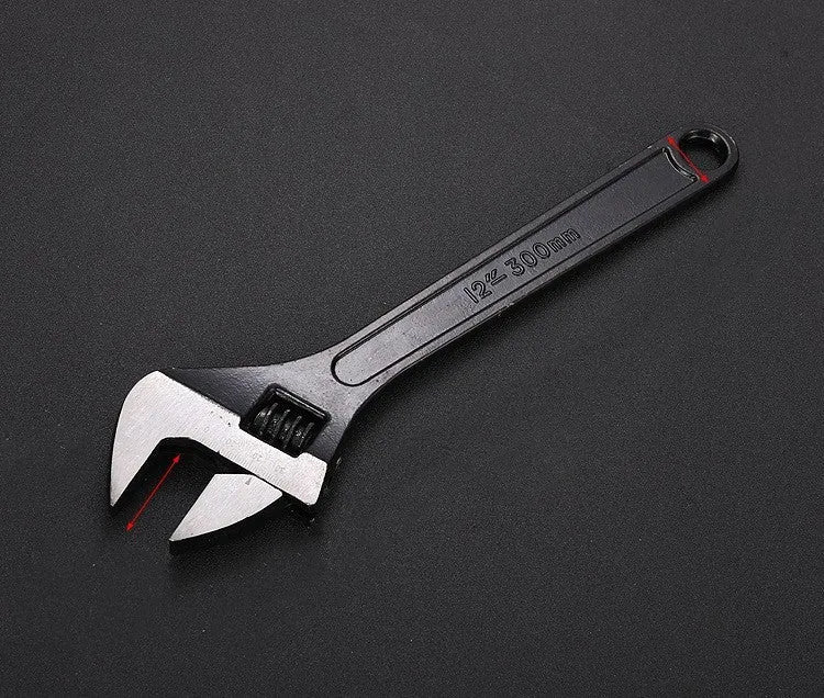 Stainless steel adjustable wrench with blackened finish showing adjustable jaw mechanism