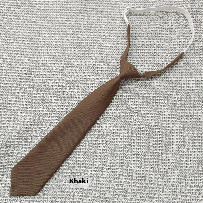 Navy blue cotton bow tie with arrow style shape measuring 35cm by 7cm