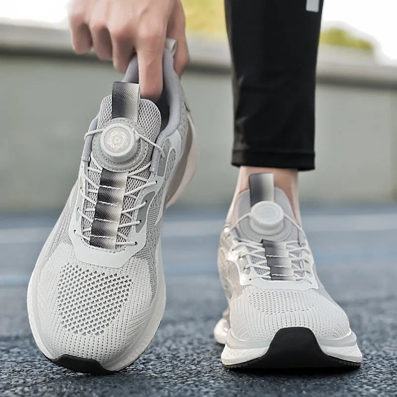 Men's white running shoes with rotating buckle closure and Fly-knit mesh upper