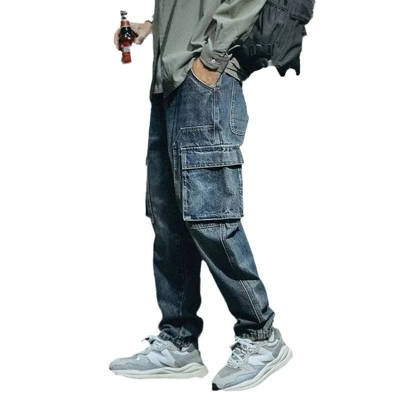 Men's blue loose straight leg stretch jeans with zip fly opening in casual retro style