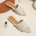 Women's denim flat slippers with leather lining and tassel detail in solid colour