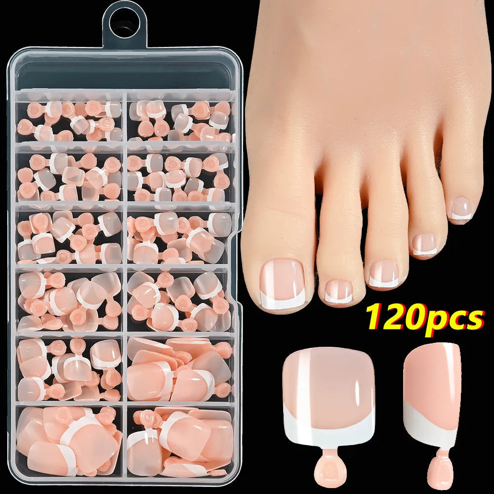 Box of 120 French white edge nude full square short artificial nail pieces showing nine colour shades