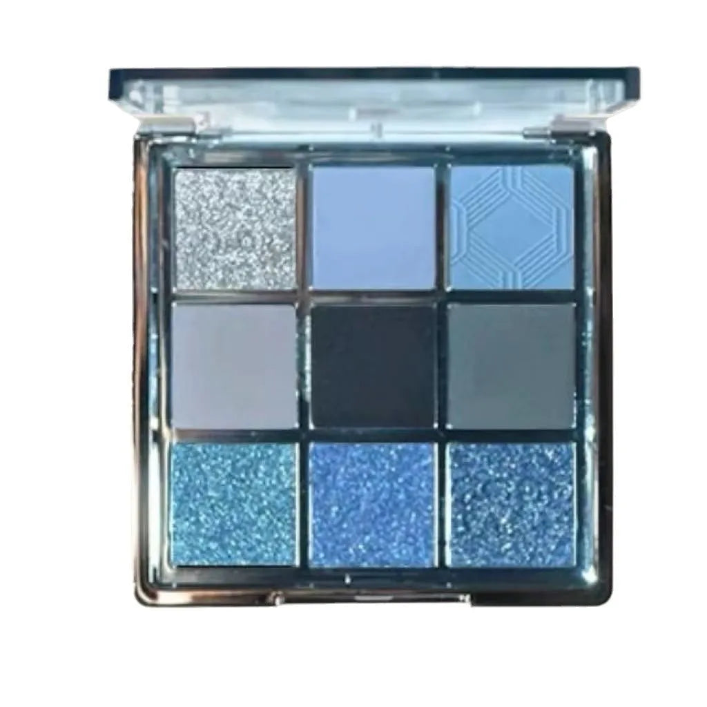 MUGELEEN nine-colour eye shadow palette showing blue smoked earth tones with matte and shimmer textures