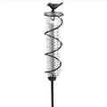 Cast iron bird-shaped rain gauge with glass measurement cylinder for garden weather tracking