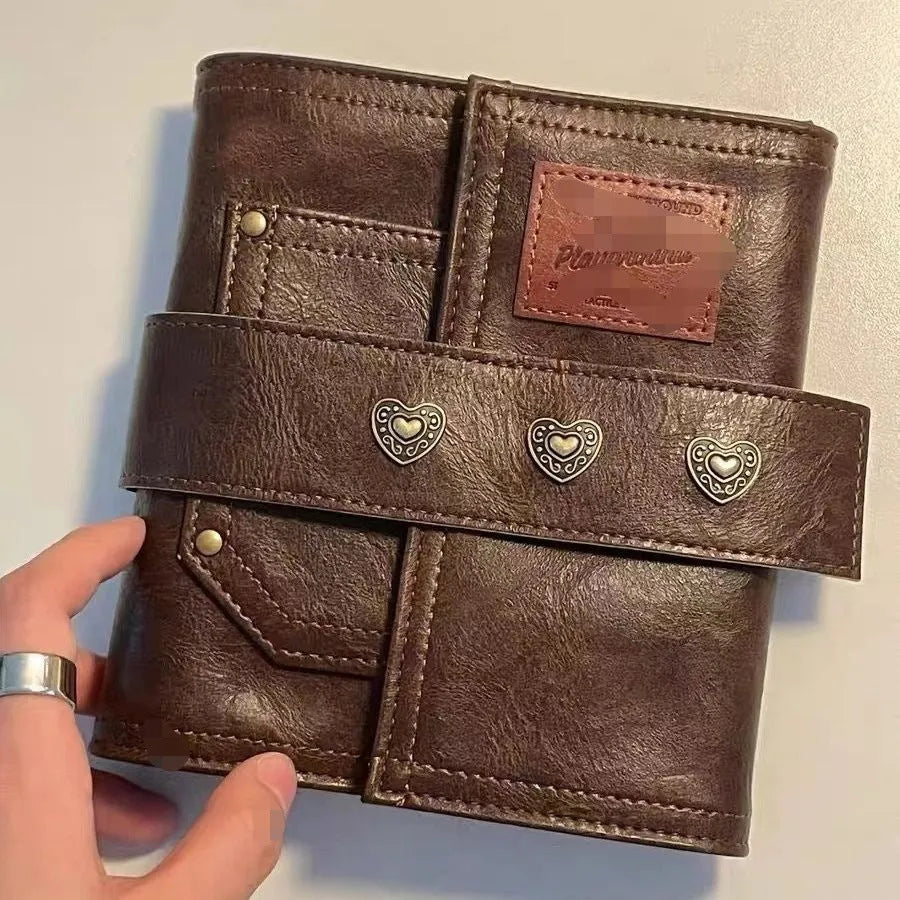 A7 brown retro leather buckle notebook with loose-leaf binding and PU cover