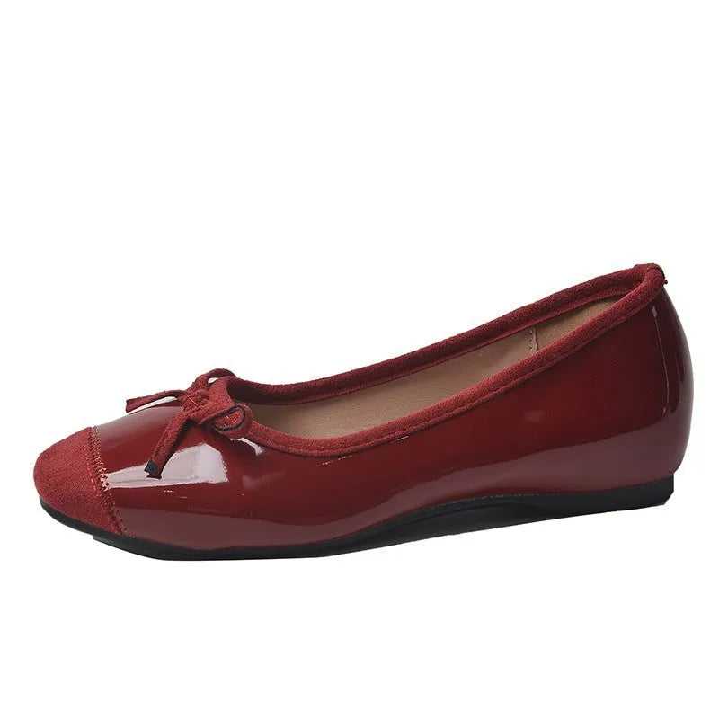 Women's wine red retro Mary Jane ballet flats with a bow and square toe on a rubber sole.