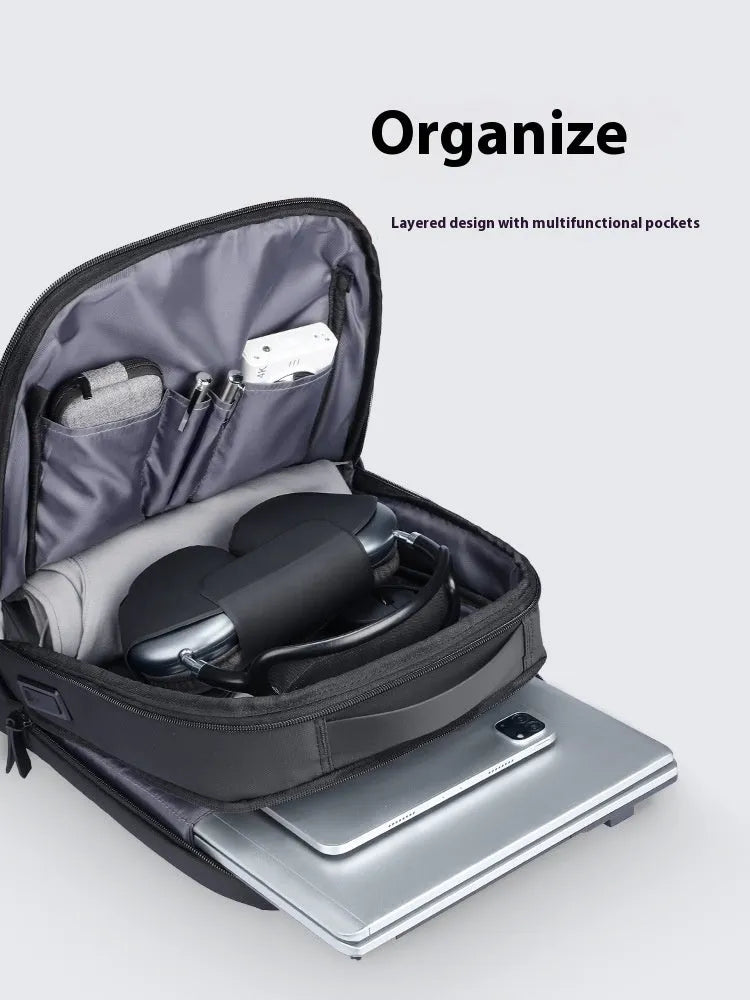 Graphite grey business backpack with USB charging port showing oxford cloth material and under 20 litre capacity