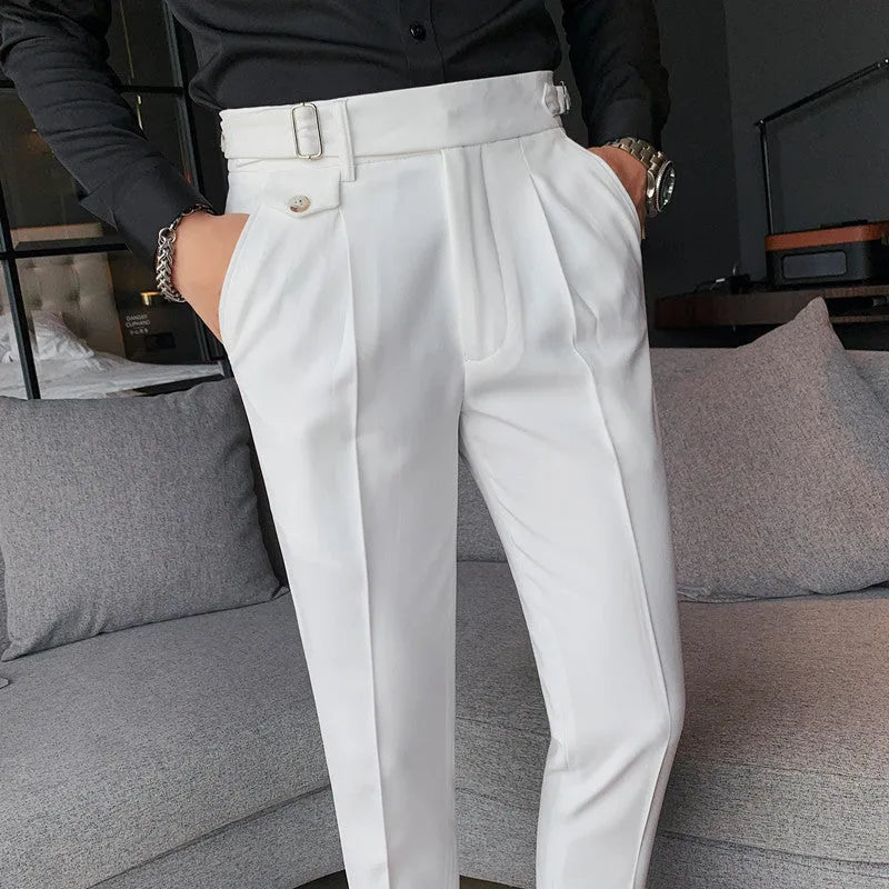 A pair of men's straight-leg casual trousers in a solid colour, laid flat to show the cut and fabric.