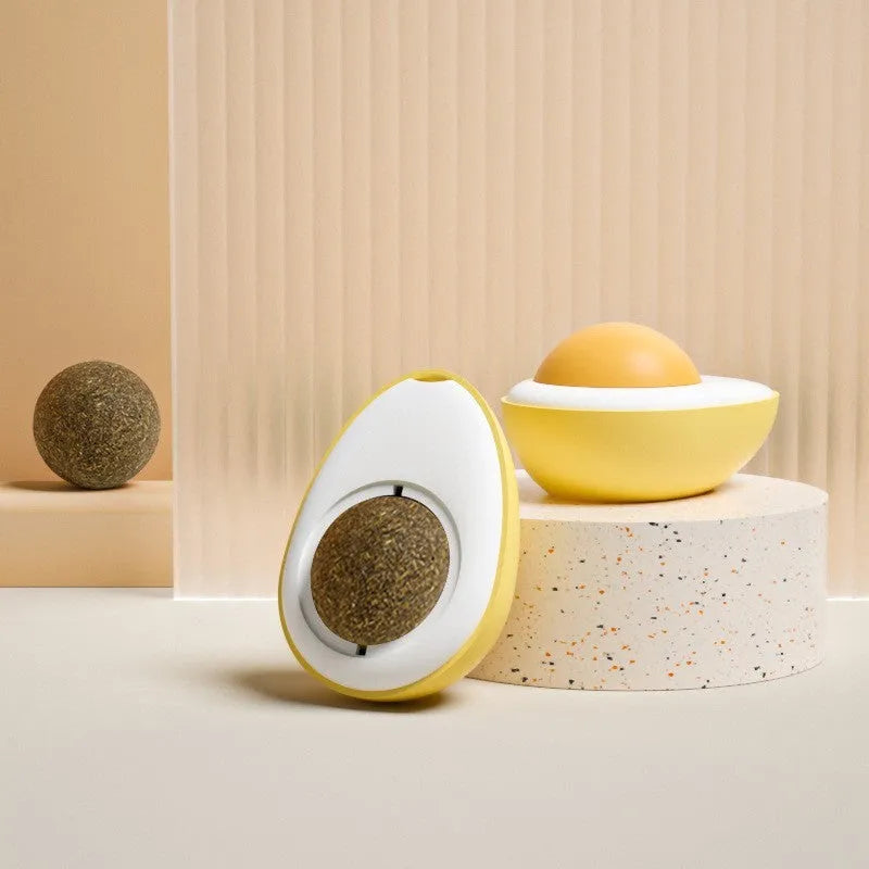 Interactive catnip ball toy with adhesive backing for walls, available in fried egg and poached egg designs