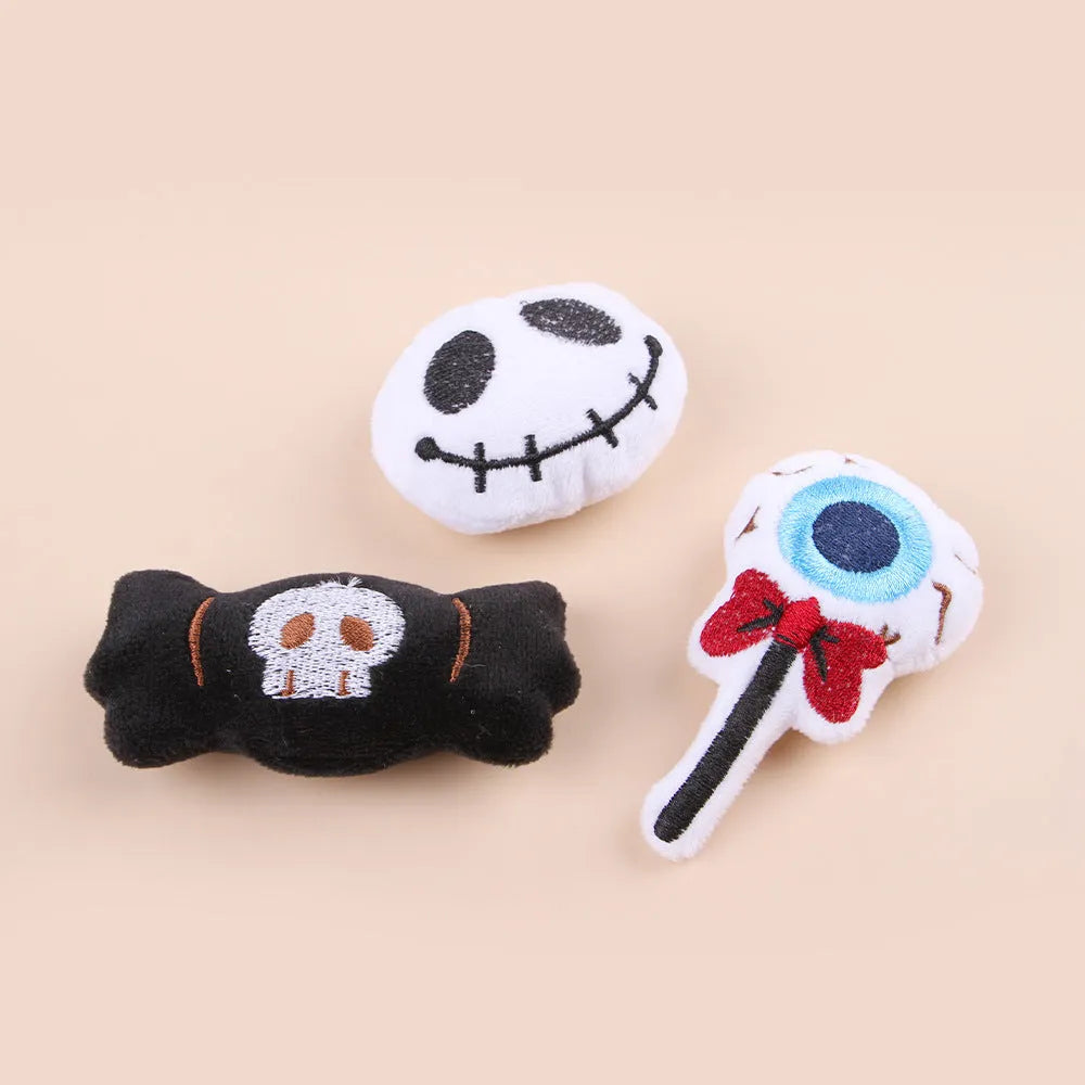 Small cat teaser wand toy with plush candy-themed attachment for interactive pet play