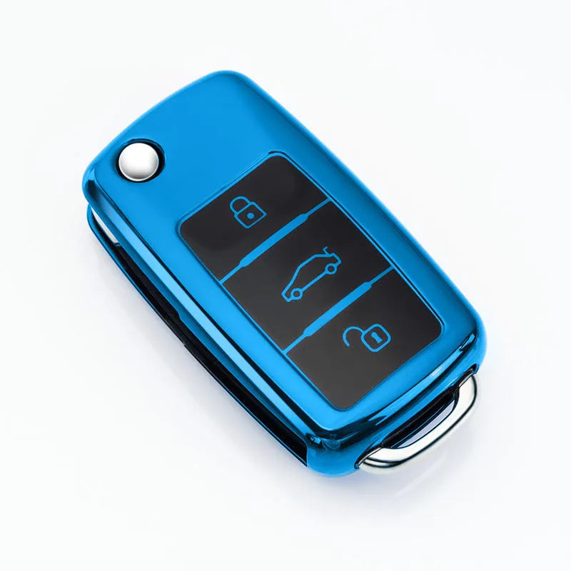 Volkswagen Model A folding key case in TPU material showing four colour options: silver, blue, pink, and red