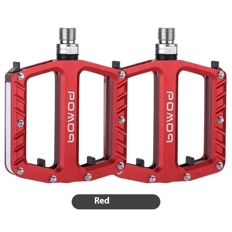 Aluminium alloy bicycle pedals with integrated LED illumination in black purple red gold titanium colour options