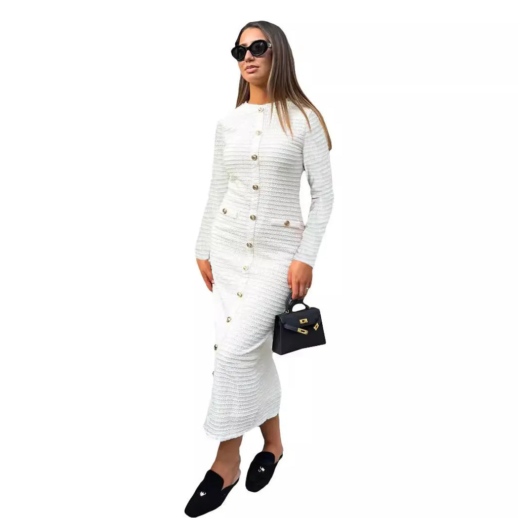 French retro slim fit knitted long sleeve dress in black with button detail and mid waist design