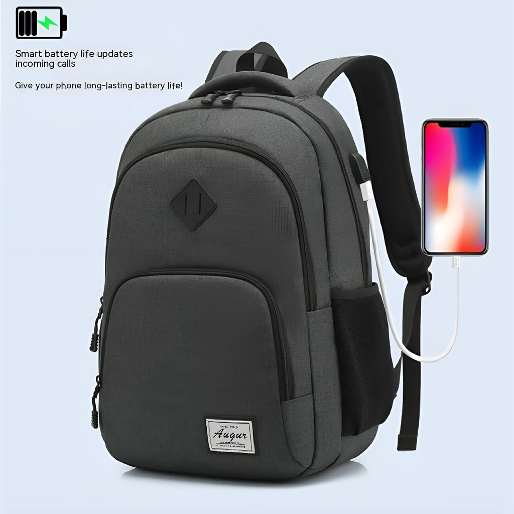 Grey lightweight backpack with USB charging port and trolley sleeve showing 32x15x46cm dimensions