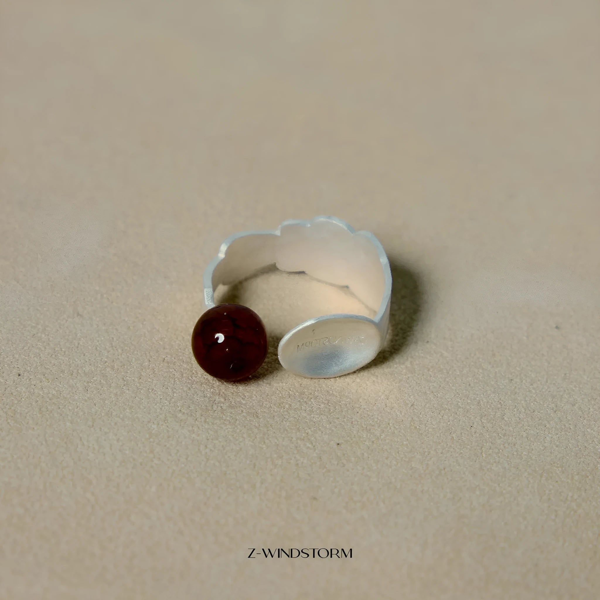 Silver tone alloy ring and bracelet set with a small stewed pork motif on diamond-shaped charms.