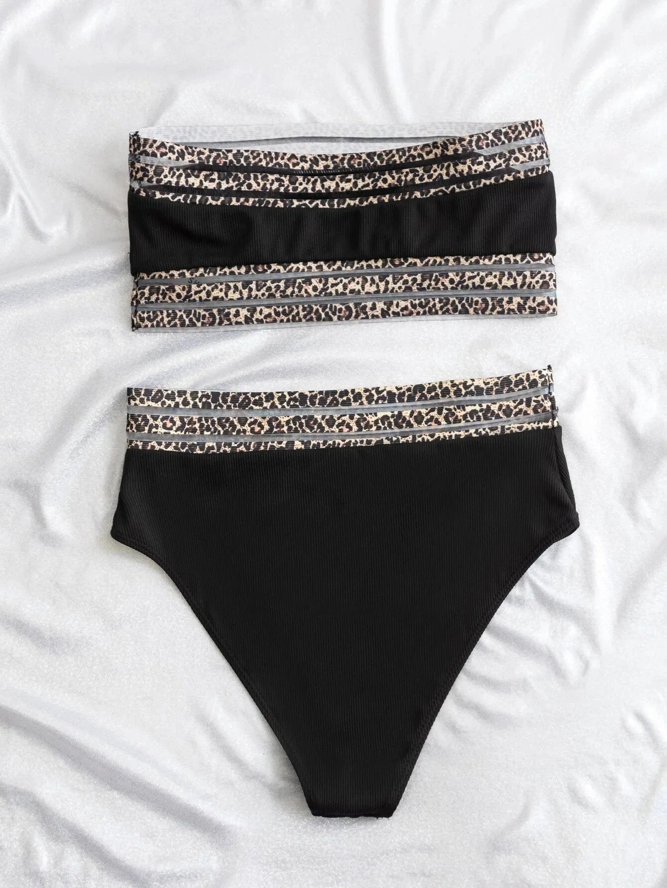 Black strapless split swimsuit with leopard print splicing pattern on mannequin