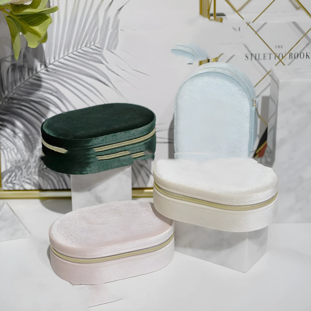 Oval velvet jewellery storage box with flannel lining in portable 15x10x5cm size