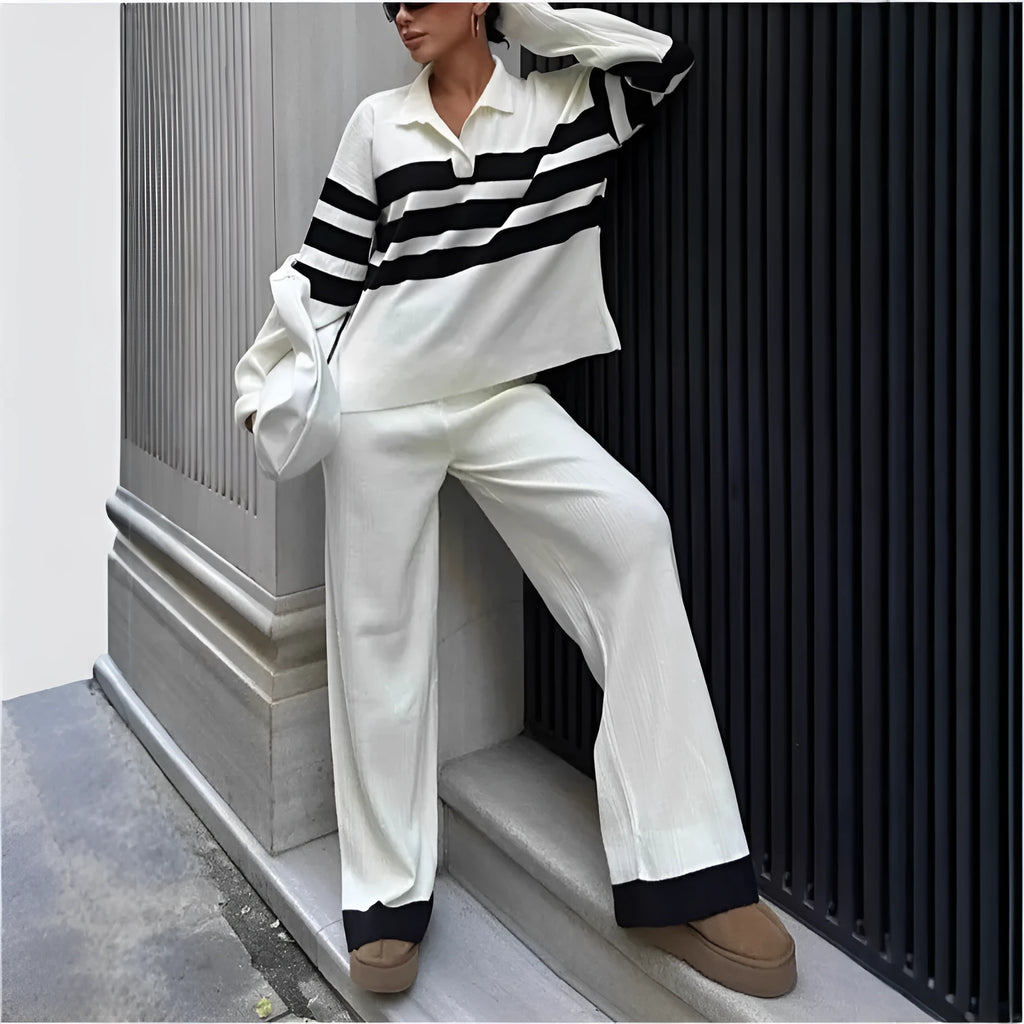 Women's black and white striped knitted two-piece set with polo collar shirt and matching trousers