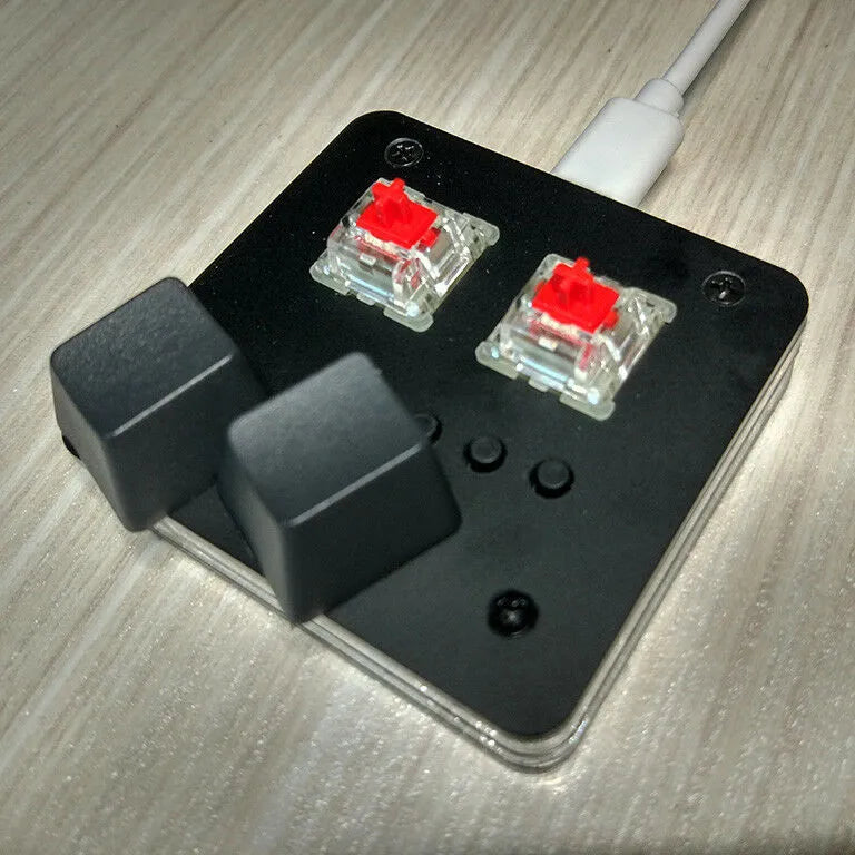 USB wired mini keyboard with multimedia keys in white, grey, black or pink measuring 6.5.6 by 1.3cm