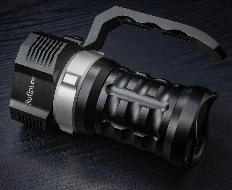 Aluminium alloy diving tube flashlight, 18cm long, shown in hand for scale.