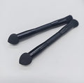 Double-headed concealer brush with black wooden handle and a miter sponge