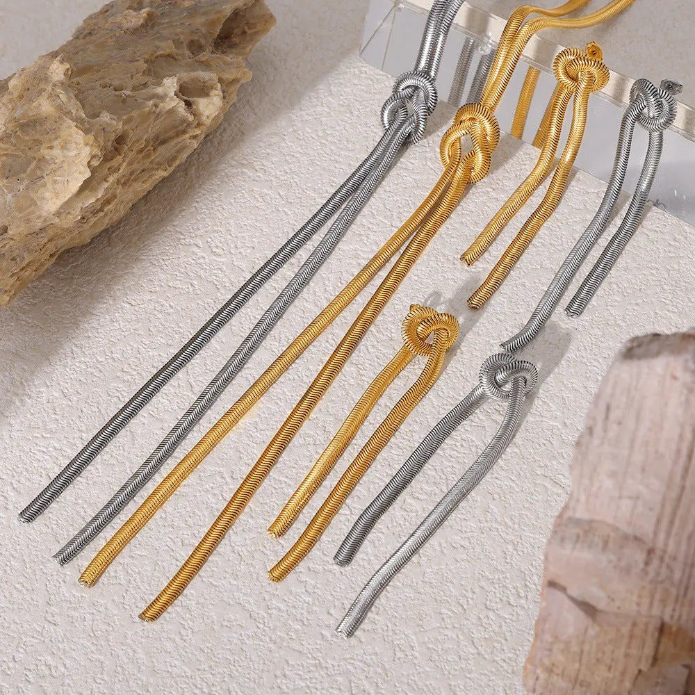 Gold knotted tassel pendant on snake chain necklace with matching earrings set