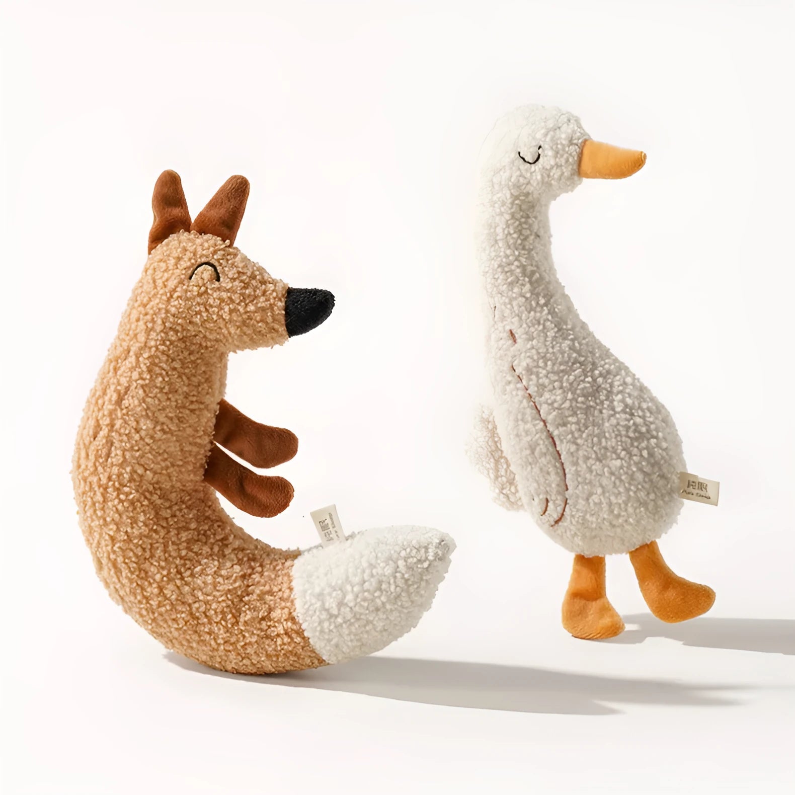Cartoon fox and duckling soft plush dog toys with crinkle sound paper inside.