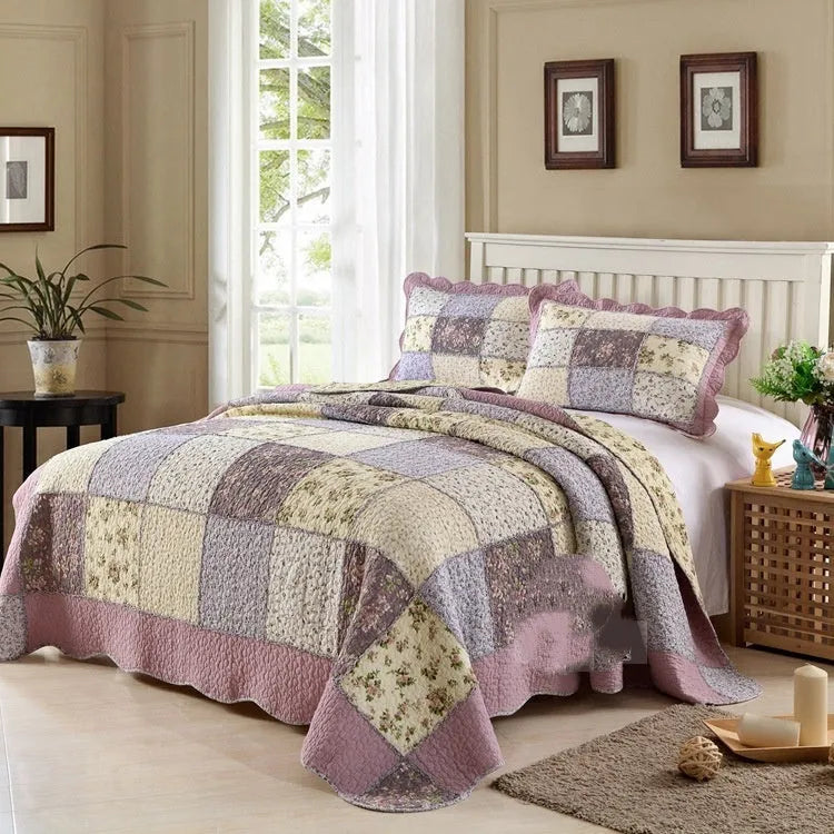Pure cotton quilted bedspread and pillowcase three-piece set in a chosen colour pattern on a bed.