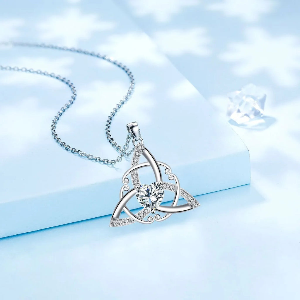 A geometric Celtic knot pendant necklace for women in an electroplated finish.