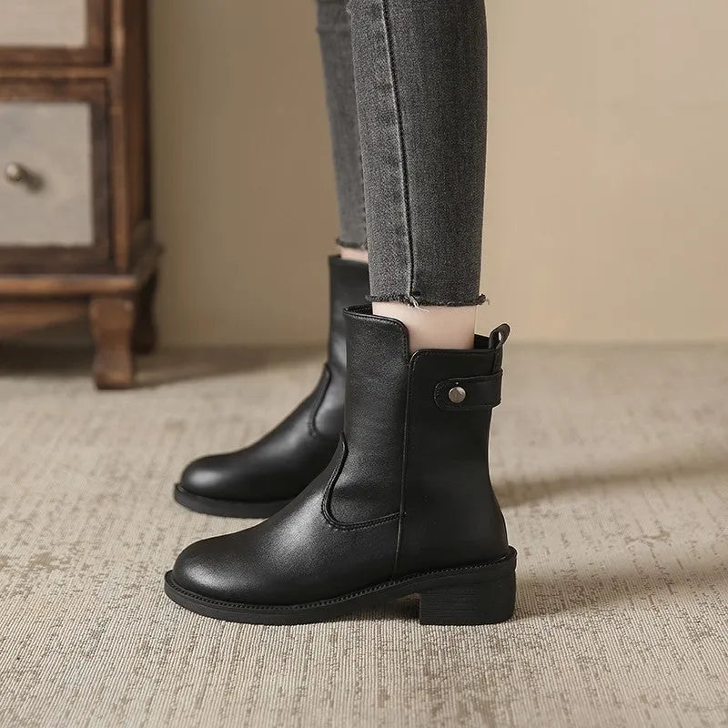 Black women's short boots with side zipper and low heel