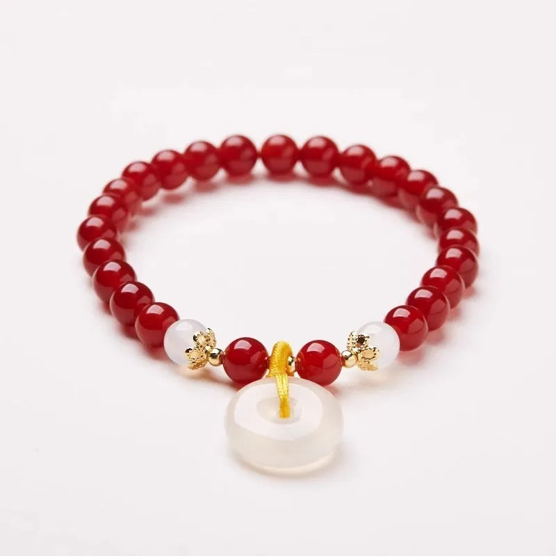Natural jade bracelet with safety buckle clasp showing 6mm agate and strawberry quartz beads