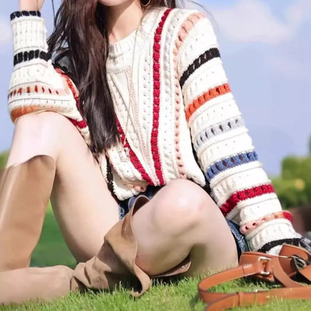 Rainbow striped loose pullover sweater with hollow knit texture and batwing sleeves