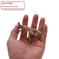 Natural Xiaoqi root wood aquarium decoration on white background showing twisted, branch-like structure.
