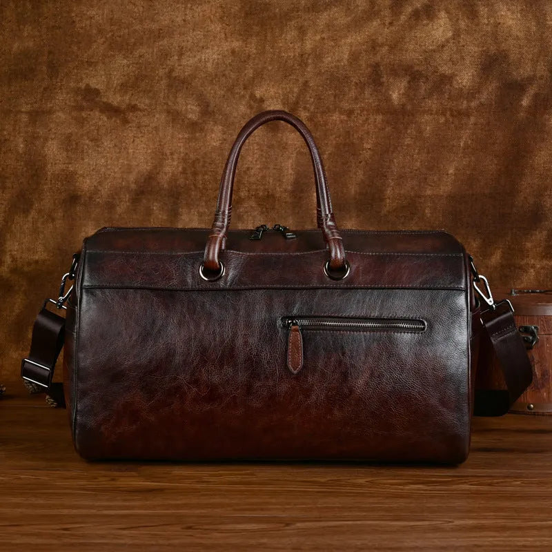 Retro leather travel bag handmade from first layer cowhide with 20L capacity