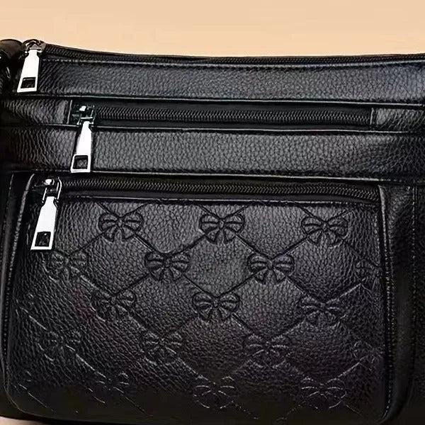 Butterfly Black PU shoulder messenger bag with embossed detail and horizontal square shape