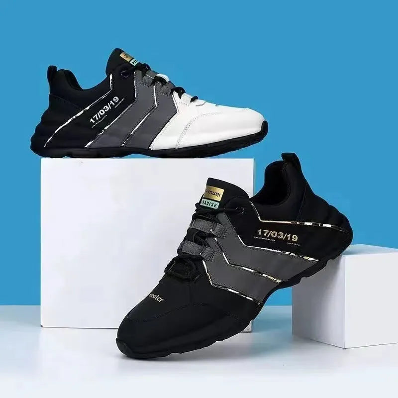 Men's black and grey low-top casual sneakers with thick plastic sole and lace-up front