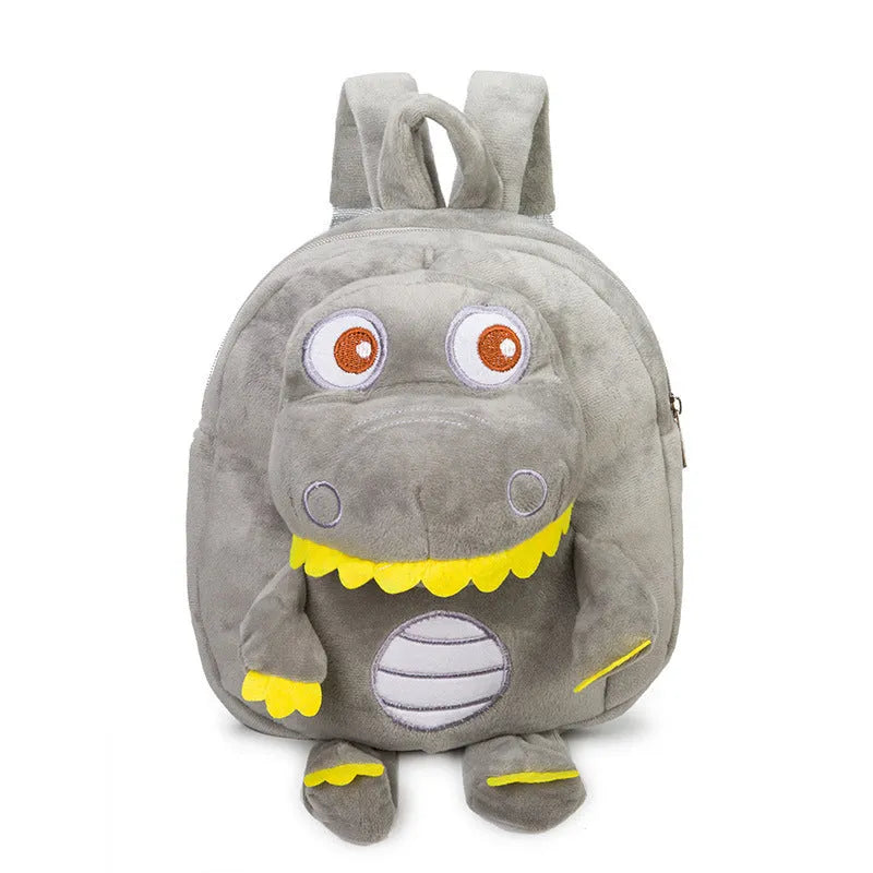 Dinosaur plush backpack for children in blue with embroidered design and soft handle