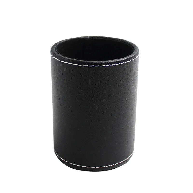 Round black leather pen container with 8.0cm diameter on wooden desk