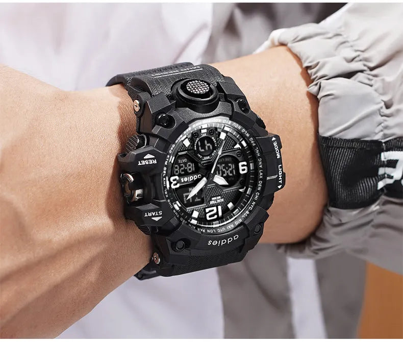 Men's black electronic sports watch showing analog hands and digital display on a plastic strap