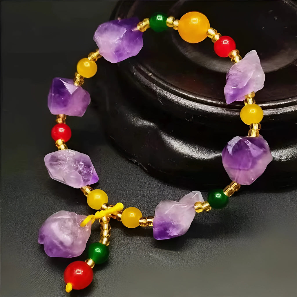 Natural shaped purple amethyst bead bracelet for women with a fu character charm.