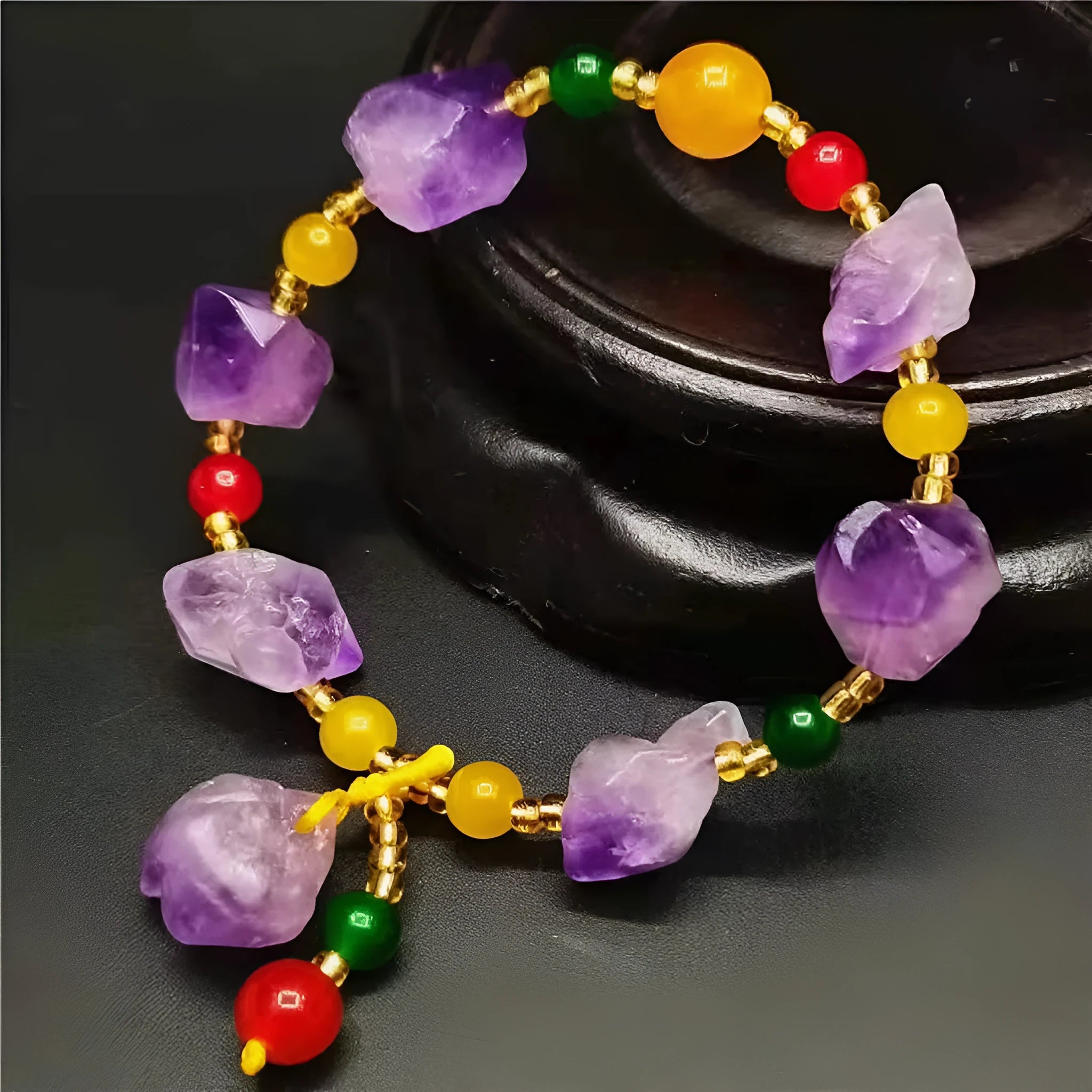Natural shaped purple amethyst bead bracelet for women with a fu character charm.