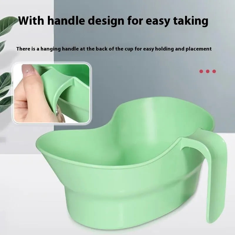 Green plastic gargle cup for bedridden elderly patient nursing care and oral hygiene