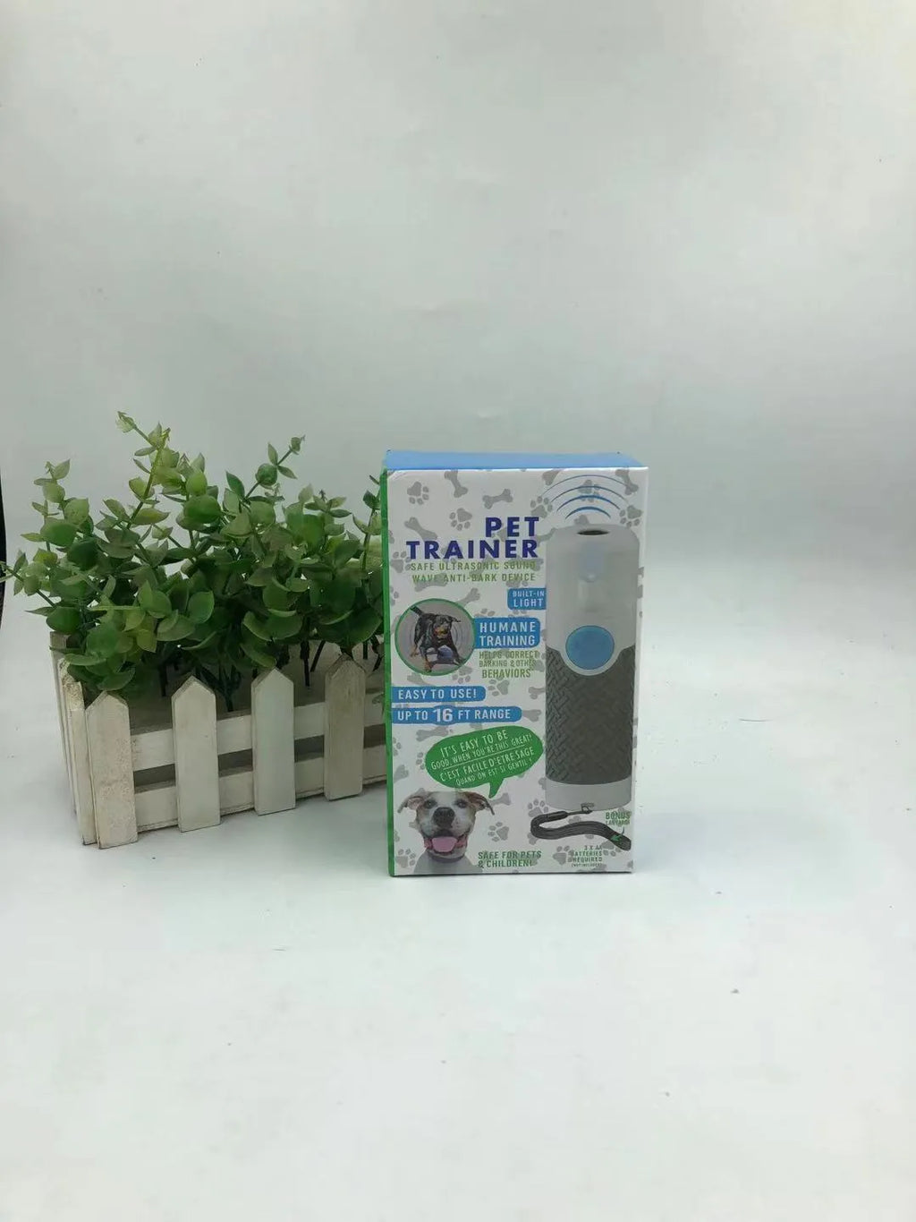 White handheld ultrasonic dog trainer with bark-stop function for behaviour correction training