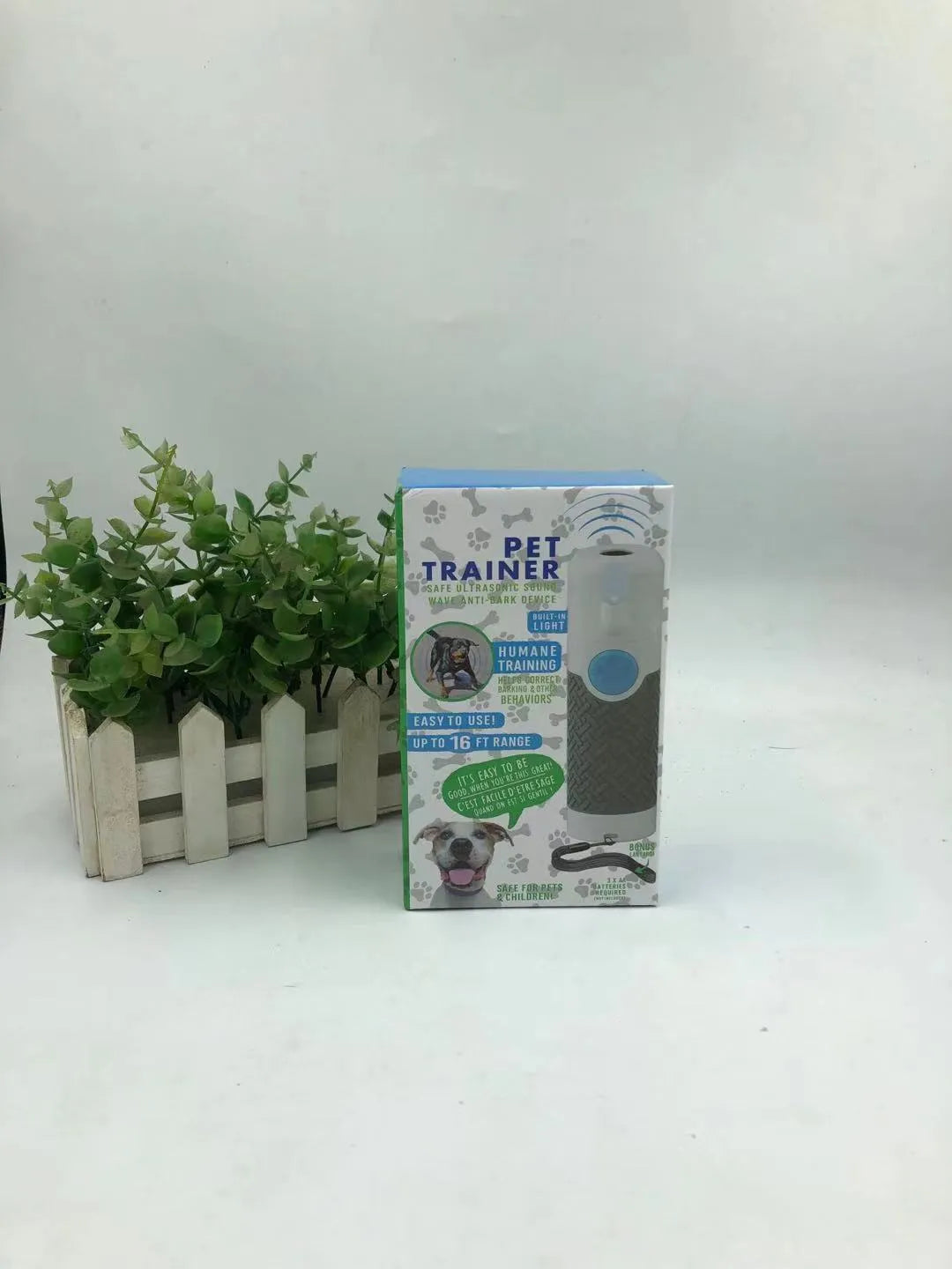 White handheld ultrasonic dog trainer with bark-stop function for behaviour correction training