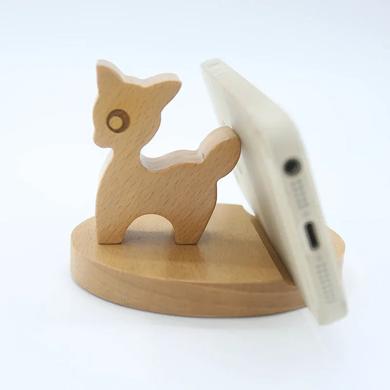 Beech wood mobile phone holder with resin animal decoration and custom lettering on coin back.